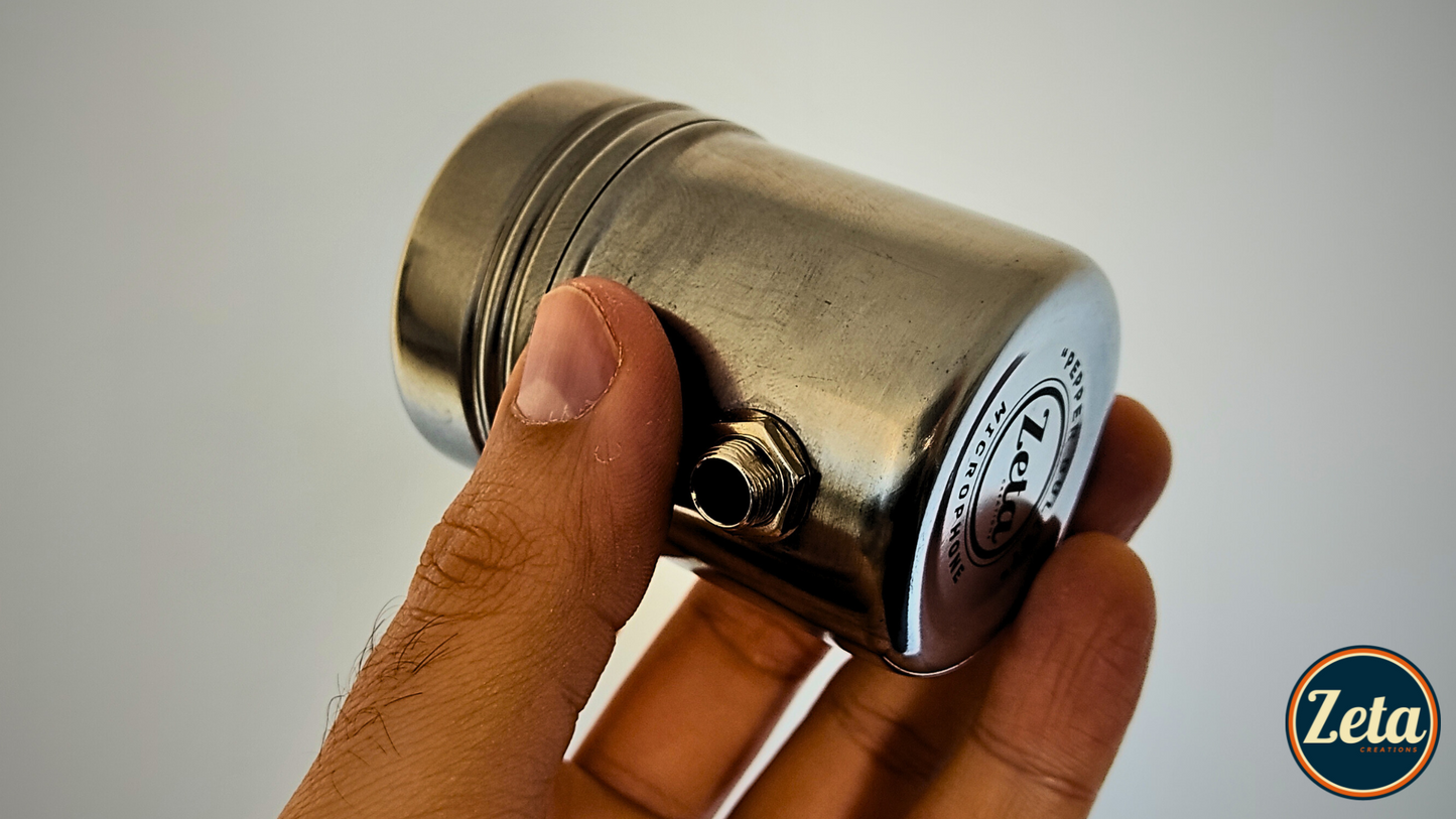 Underside of PEPPER BULLET MIC showing mic stand screw mount and construction details