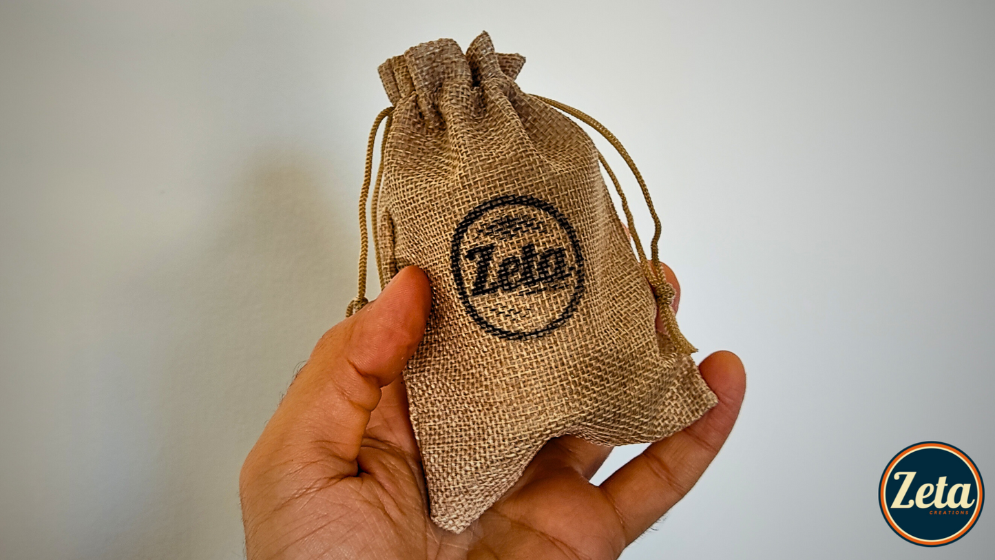 Burlap bag with Zeta Creations seal – handmade packaging for PEPPER BULLET MIC