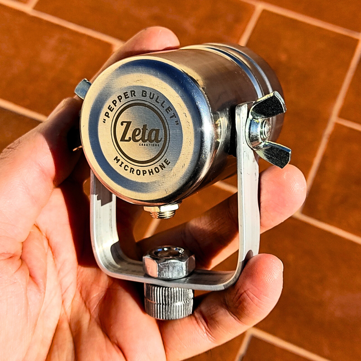 Fourth angle of PEPPER BULLET MIC – showcasing design, mount and texture of handmade mic