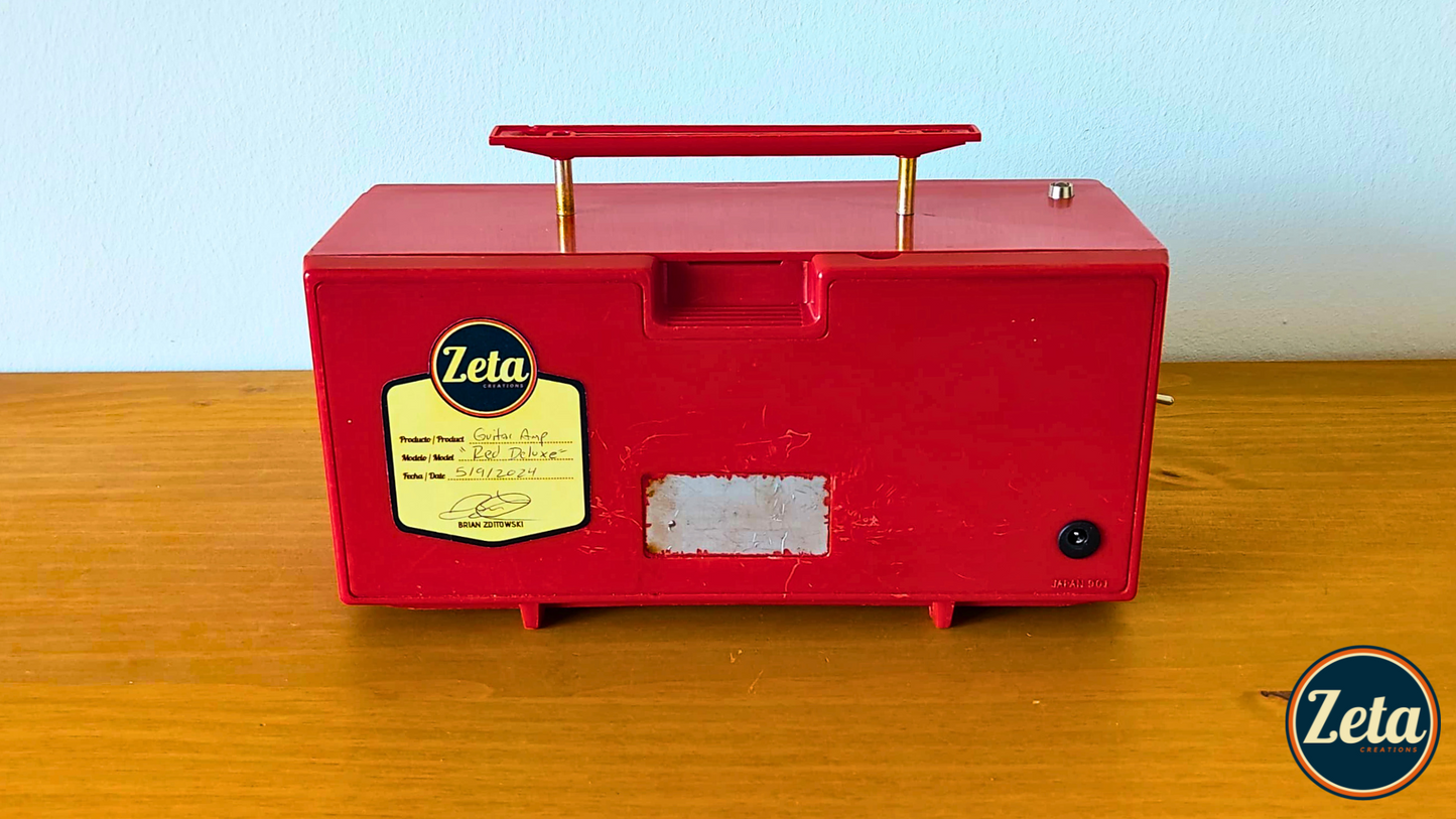 "RED DELUXE" Portable guitar radio amp by Zeta Creations