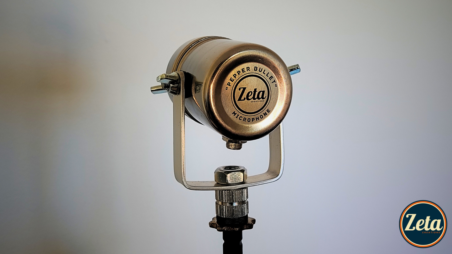 Rear angled view of PEPPER BULLET MIC showing handmade aluminum mic stand mount

